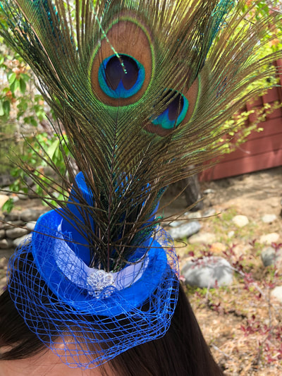 Tiny Hat with Peacock Feathers $90